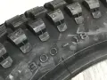 Gomma irc tyres con tasselli pronunciati e misure 3.00-18 incise.