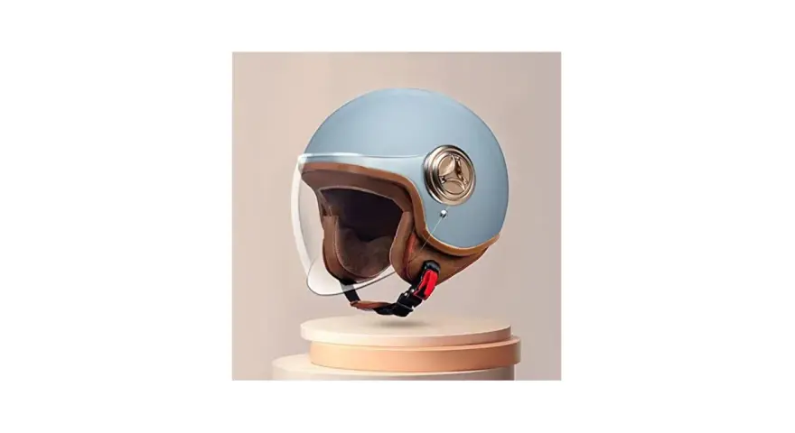 Caschi moto bambini taglie: un elegante casco jet azzurro con dettagli in ecopelle marrone e visiera trasparente, perfetto per la sicurezza dei più piccoli.